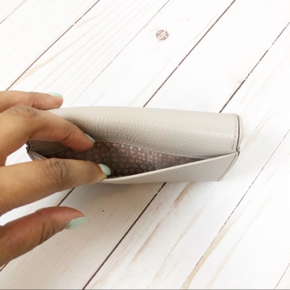 The Kate Spade New York continental wallet is a st - Picture 6 of 6